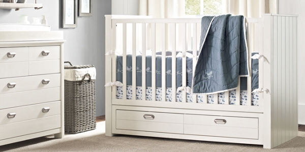 white washed baby crib