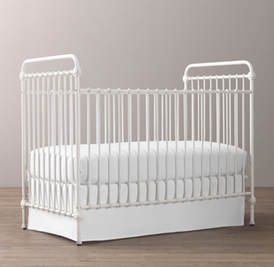 white iron baby bed