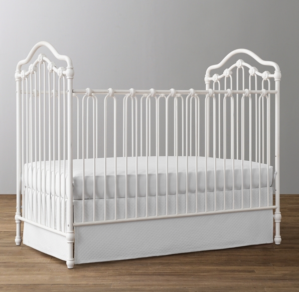 white metal baby crib