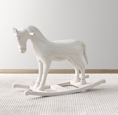 white wooden rocking horse