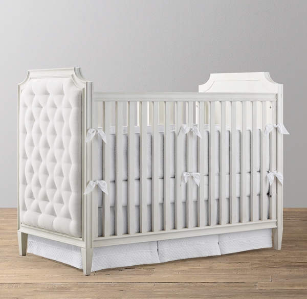 white tufted crib