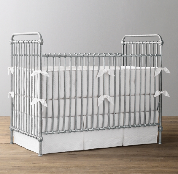 gray metal crib